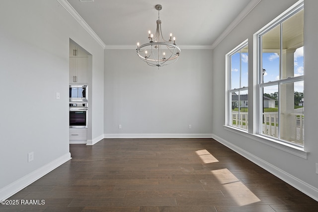 104 Manor House Ln, Lafayette, LA 70507 - unfurnished dining area featuring crown molding, plenty of natural light, a notable chandelier, and dark wood-style flooring