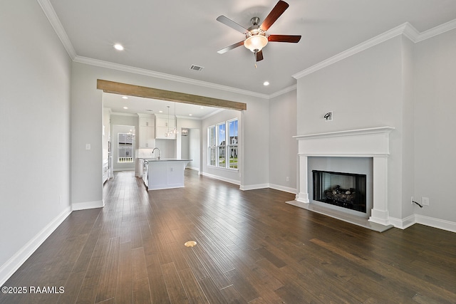 104 Manor House Ln, Lafayette, LA 70507 - unfurnished living room with a fireplace with flush hearth, dark wood-style flooring, baseboards, visible vents, and a ceiling fan