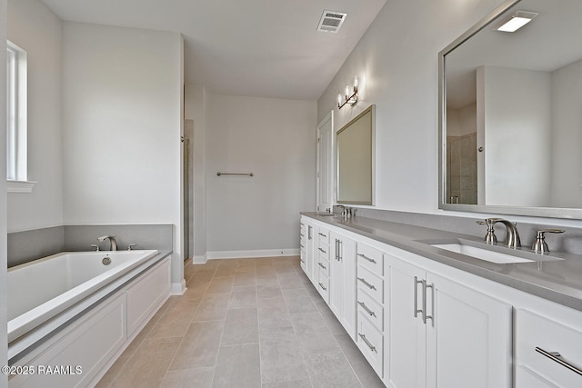 104 Manor House Ln, Lafayette, LA 70507 - bathroom featuring visible vents, a stall shower, and a sink