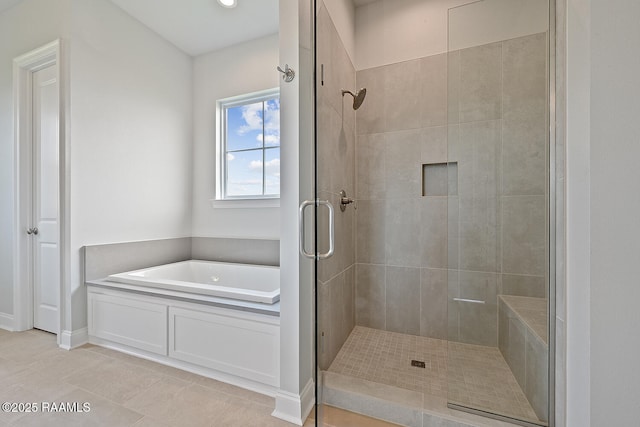 104 Manor House Ln, Lafayette, LA 70507 - full bath with a shower stall, a garden tub, tile patterned floors, and baseboards
