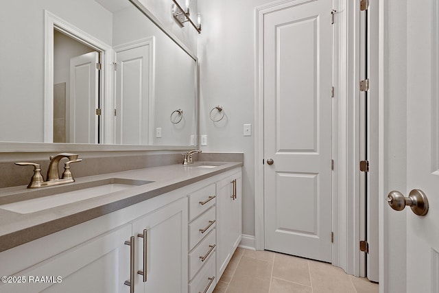 104 Manor House Ln, Lafayette, LA 70507 - bathroom featuring tile patterned floors, a sink, and double vanity