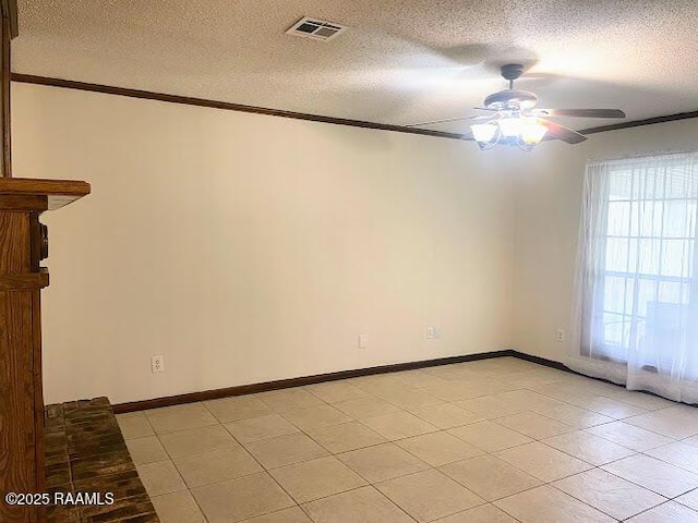 210 Essex St, Lafayette, LA 70506 - empty room featuring visible vents, ornamental molding, baseboards, a textured ceiling, and ceiling fan