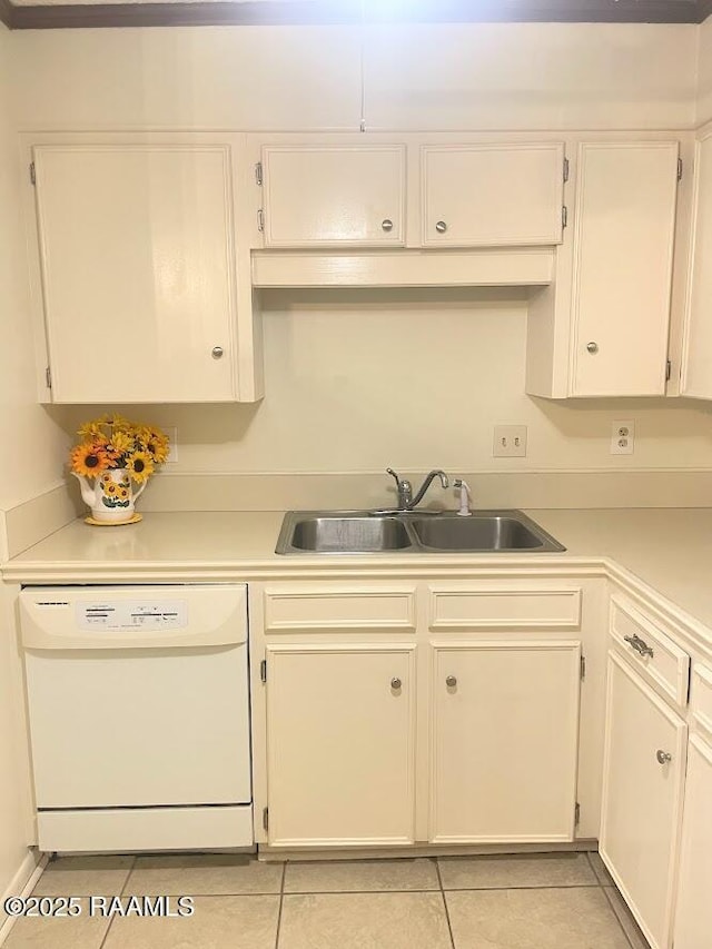 210 Essex St, Lafayette, LA 70506 - kitchen with dishwasher, a sink, light countertops, and light tile patterned floors