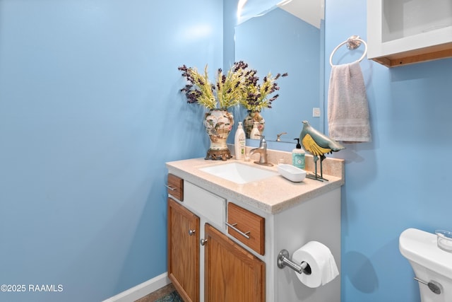 220 N Philo Dr, Lafayette, LA 70506 - half bathroom featuring toilet and vanity