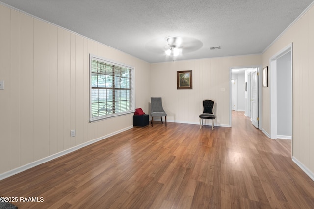 220 N Philo Dr, Lafayette, LA 70506 - unfurnished room featuring ceiling fan, wood finished floors, baseboards, and ornamental molding