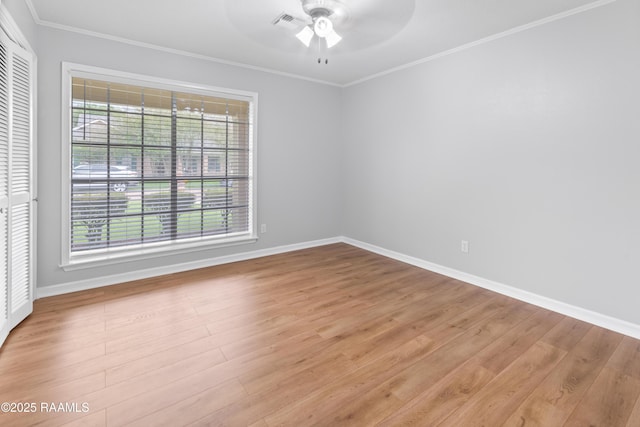 220 N Philo Dr, Lafayette, LA 70506 - unfurnished room featuring wood finished floors, crown molding, baseboards, and ceiling fan
