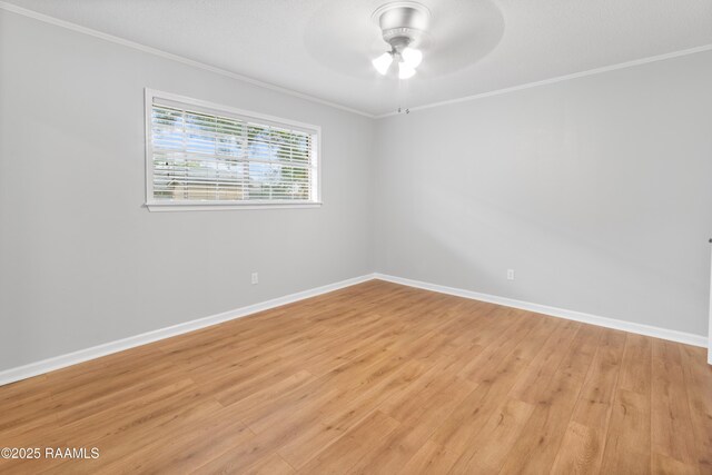 220 N Philo Dr, Lafayette, LA 70506 - empty room with ceiling fan, baseboards, ornamental molding, and light wood-style flooring