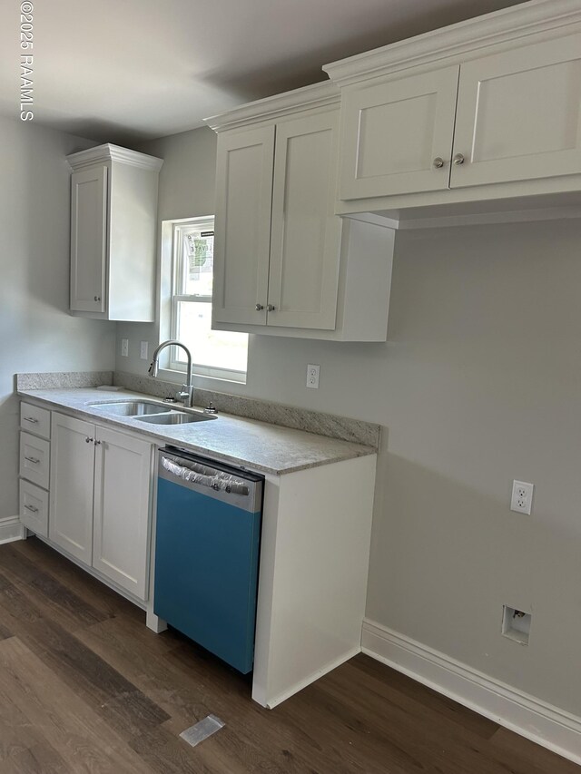 347 Marie St, Sunset, LA 70584 - kitchen featuring white cabinets, dark wood finished floors, dishwashing machine, and a sink