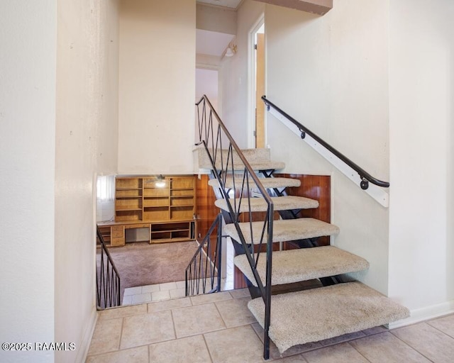 221 Beverly Dr, Lafayette, LA 70503 - staircase with baseboards and tile patterned flooring