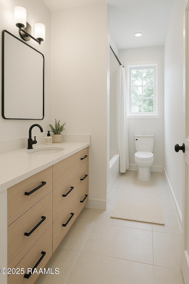 2318 Helen St, Abbeville, LA 70510 - bathroom with tile patterned flooring, baseboards, vanity, toilet, and shower / bath combo with shower curtain