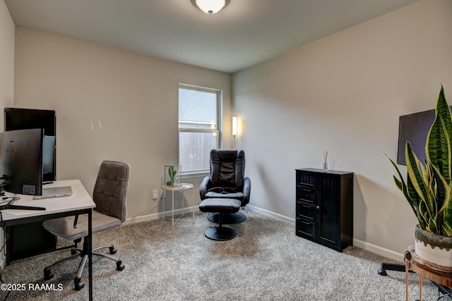 carpeted home office with baseboards