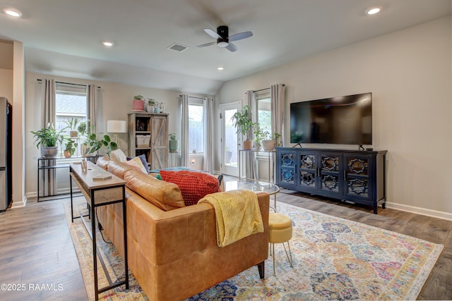 living area featuring wood finished floors, recessed lighting, and ceiling fan