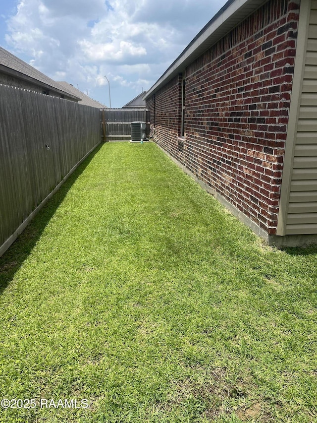 113 S Lakepointe Dr, Lafayette, LA 70506 - view of yard featuring cooling unit