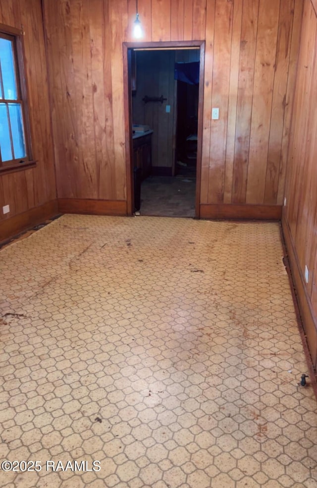 620 Boudreaux St, Franklin, LA 70538 - spare room with wood walls and baseboards