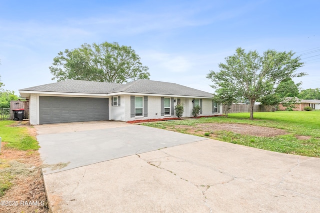 ranch-style home featuring an attached garage, driveway, and brick siding