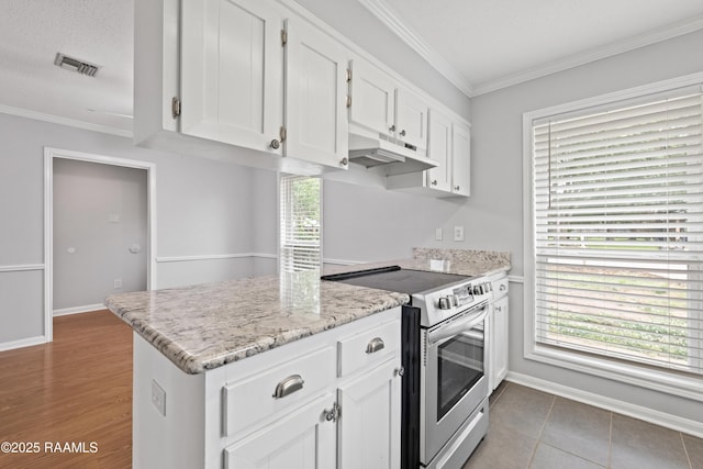 kitchen featuring stainless steel range with electric stovetop, under cabinet range hood, white cabinets, crown molding, and light stone counters