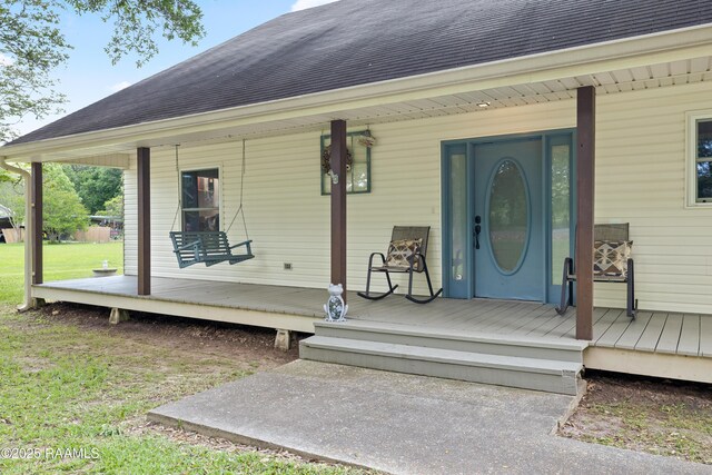 334 Meche Rd, Carencro, LA 70520 - property entrance featuring roof with shingles and a porch