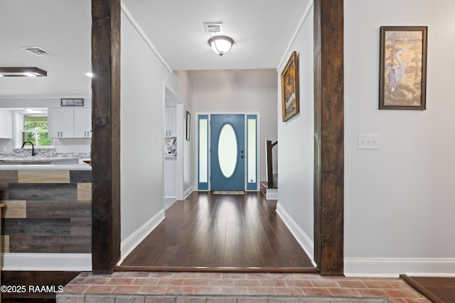 334 Meche Rd, Carencro, LA 70520 - entrance foyer with baseboards and wood finished floors