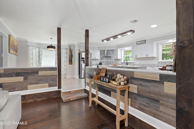 334 Meche Rd, Carencro, LA 70520 - kitchen with stainless steel fridge with ice dispenser, light countertops, dark wood-style floors, white cabinetry, and recessed lighting