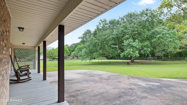 334 Meche Rd, Carencro, LA 70520 - view of patio / terrace with view of wooded area