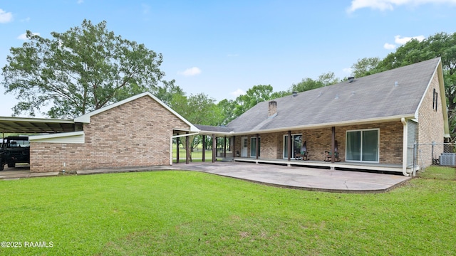 334 Meche Rd, Carencro, LA 70520 - back of house with brick siding, a patio area, and central AC unit