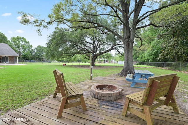 334 Meche Rd, Carencro, LA 70520 - wooden deck featuring a fire pit