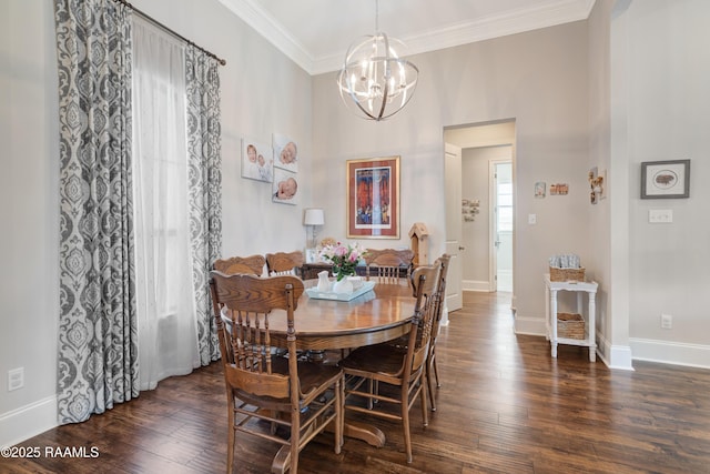 dining area featuring ornamental molding, baseboards, a notable chandelier, and wood finished floors