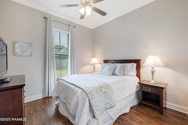 bedroom featuring dark wood-type flooring, ceiling fan, baseboards, and ornamental molding