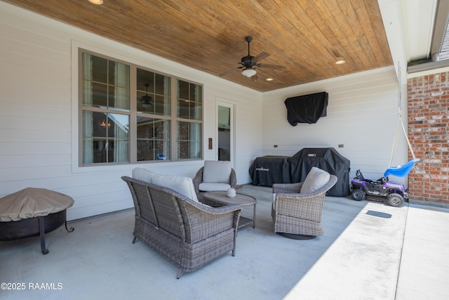 view of patio / terrace with grilling area, ceiling fan, and outdoor lounge area