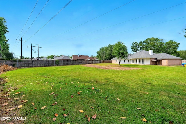 view of yard featuring fence