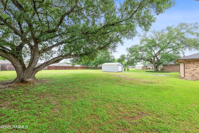 103 Failla Rd, Lafayette, LA 70508 - view of yard with fence, an outdoor structure, and a shed
