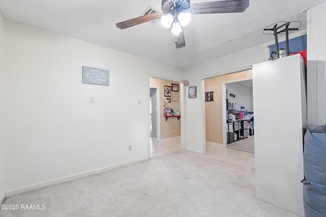 103 Failla Rd, Lafayette, LA 70508 - carpeted spare room featuring a textured ceiling, baseboards, and ceiling fan