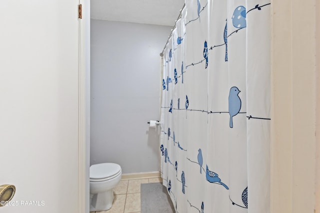 103 Failla Rd, Lafayette, LA 70508 - bathroom featuring a shower with curtain, tile patterned flooring, baseboards, and toilet