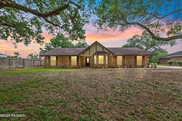 103 Failla Rd, Lafayette, LA 70508 - view of front of home featuring fence and brick siding