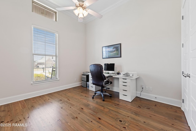 office featuring ceiling fan, baseboards, ornamental molding, and wood finished floors