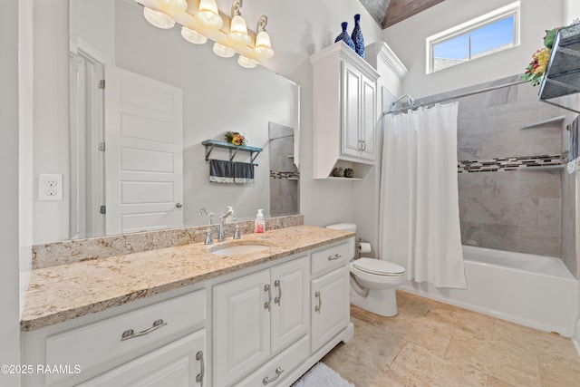 full bathroom featuring vanity, toilet, and shower / bath combination with curtain