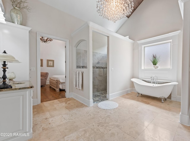 bathroom featuring a freestanding tub, high vaulted ceiling, a walk in shower, a chandelier, and ensuite bath