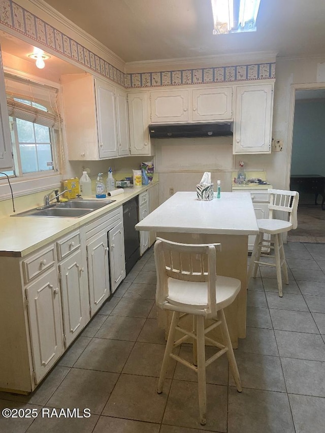124 Brookside Dr, Lafayette, LA 70505 - kitchen featuring tile patterned flooring, under cabinet range hood, light countertops, a sink, and black dishwasher