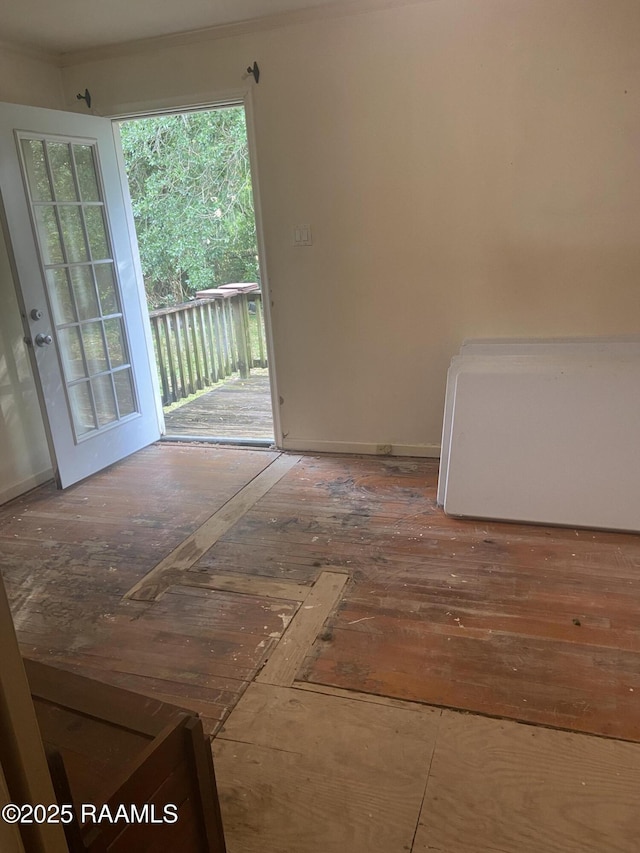 124 Brookside Dr, Lafayette, LA 70505 - spare room with ornamental molding and wood finished floors