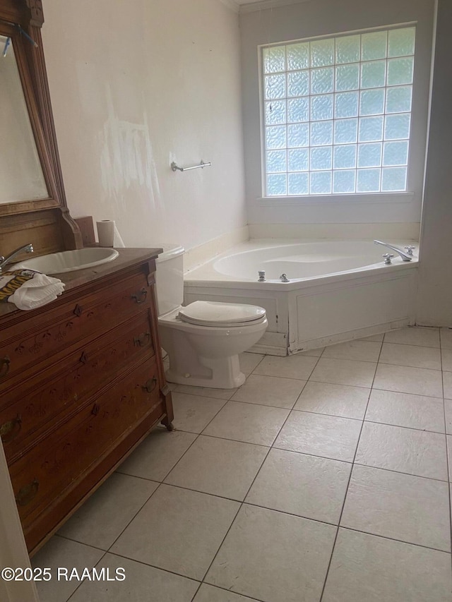 124 Brookside Dr, Lafayette, LA 70505 - bathroom with a bath, tile patterned floors, vanity, and toilet