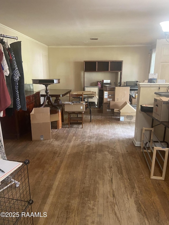 124 Brookside Dr, Lafayette, LA 70505 - dining area featuring visible vents, wood finished floors, and crown molding