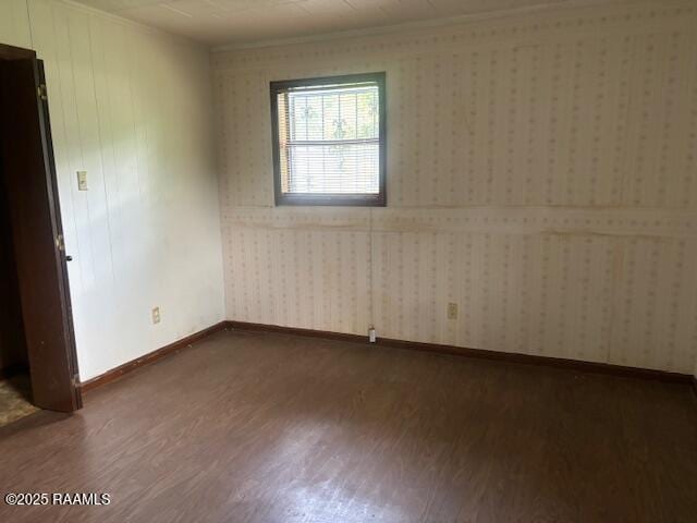 1614 Norway St, Opelousas, LA 70570 - unfurnished room with wood finished floors and crown molding