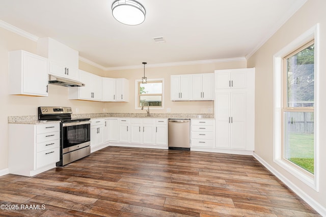813 S Arenas St, Rayne, LA 70578 - kitchen featuring crown molding, dark wood-style flooring, appliances with stainless steel finishes, and under cabinet range hood