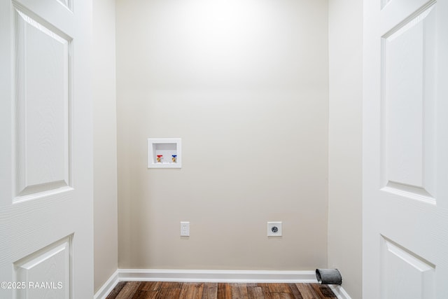 813 S Arenas St, Rayne, LA 70578 - laundry room with dark wood-style floors, laundry area, hookup for an electric dryer, hookup for a washing machine, and baseboards