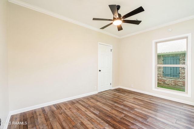 813 S Arenas St, Rayne, LA 70578 - spare room featuring ceiling fan, hardwood / wood-style floors, baseboards, and ornamental molding