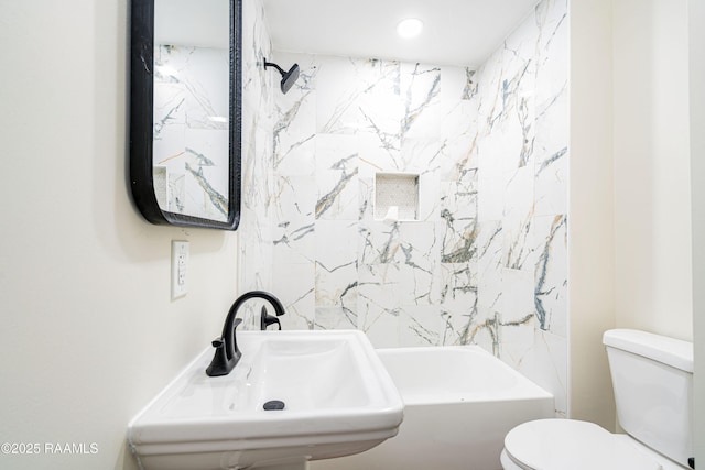 906 Priscilla Ln, Lafayette, LA 70501 - bathroom with bathing tub / shower combination, toilet, a sink, and recessed lighting