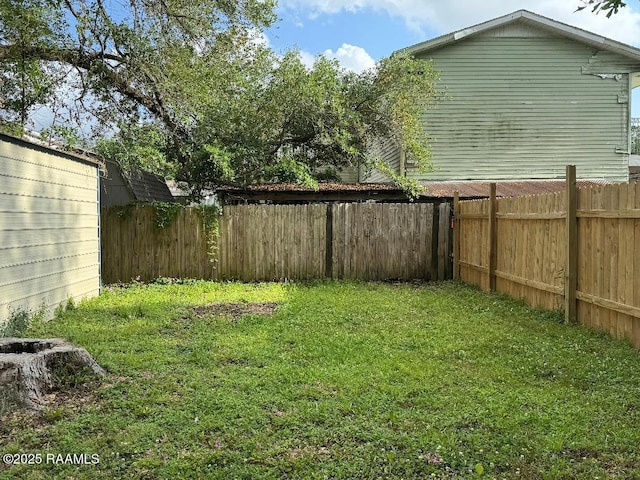 view of yard featuring a fenced backyard