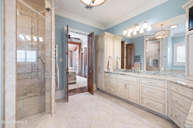 full bathroom with ornamental molding, a shower stall, ensuite bathroom, vanity, and tile patterned floors