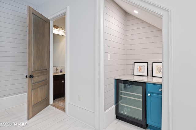 114 Daniel Ln, New Iberia, LA 70563 - indoor dry bar featuring beverage cooler and wooden walls