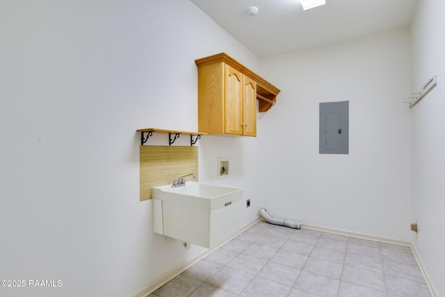 laundry room with cabinet space, electric panel, washer hookup, and baseboards